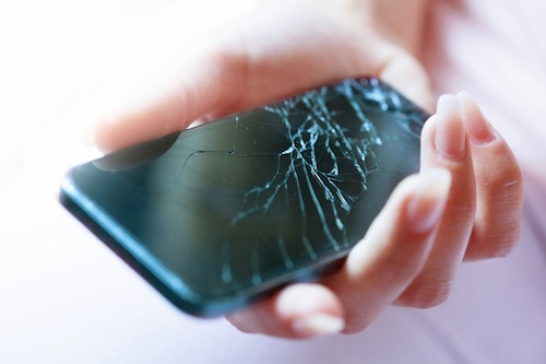 Image of a broken, cracked smartphone 