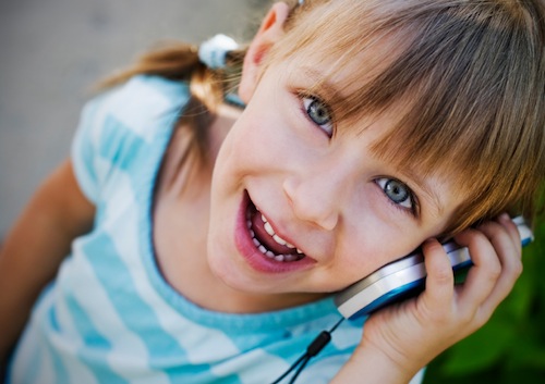 Picture of little girl talking on the mobile phone